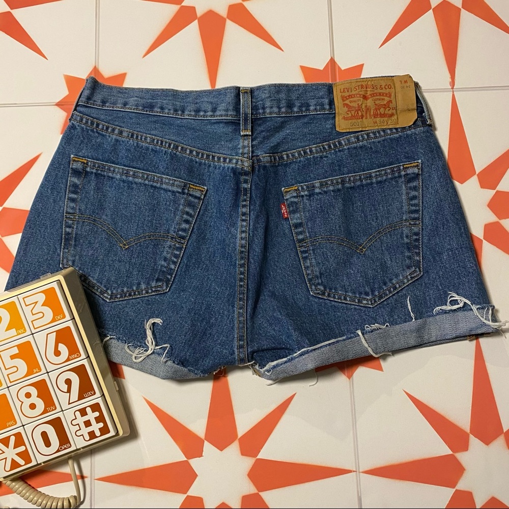 Levi 501 Mid rise Mid Wash Denim Cutoffs